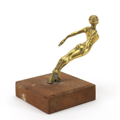 766 - Art Deco car mascot of a nude female by Desmo, raised on a wood block base, the mascot 11cm high