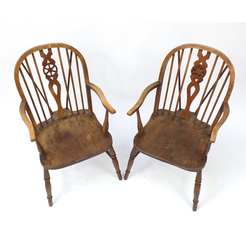 111 - Pair of antique wheel back elbow chairs with elm seats, 98cm high