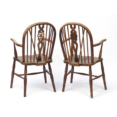 111 - Pair of antique wheel back elbow chairs with elm seats, 98cm high