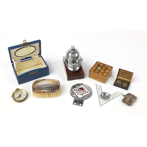 767 - Antique and later miscellaneous objects including a Fireman's helmet car mascot, silver vesta, car b... 