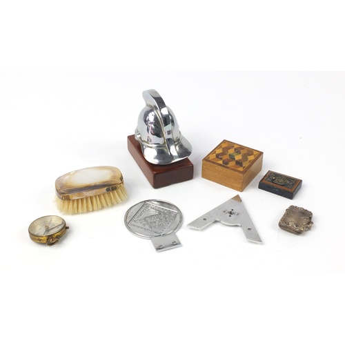 767 - Antique and later miscellaneous objects including a Fireman's helmet car mascot, silver vesta, car b... 