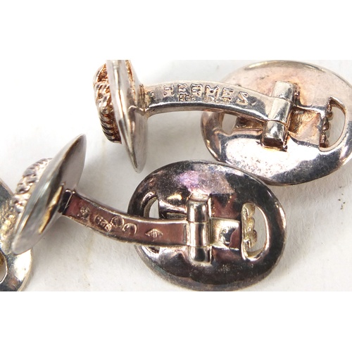 86 - Two pairs of silver cufflinks by Hermes, HGB maker's mark, London 1959, each 2.4cm in length, 33.0g