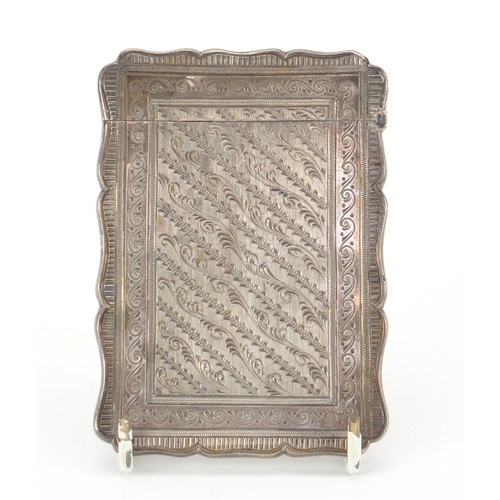 3685 - Victorian silver serpentine shaped card case, engraved with leaves and foliage, by Robert Thornton, ... 