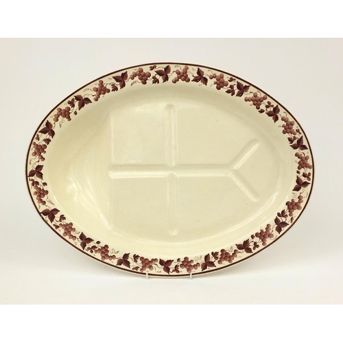 3367 - 19th century Swansea creamware pottery meat platter, the boarder decorated with leaves and berries, ... 