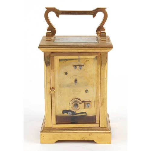 3055 - Garrard & Co brass cased carriage clock with enamelled dial having Roman numerals and box, 12cm high