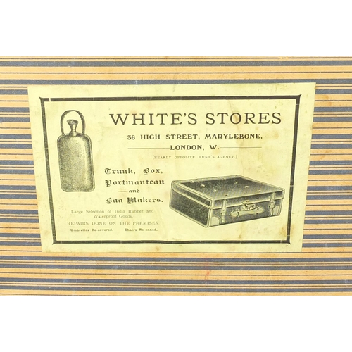 3512 - Vintage wooden bound travelling trunk with carrying handles, Whites Store label to the interior, 45.... 