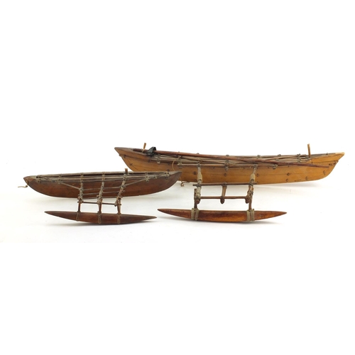 3346 - Well detailed wooden model of a catamaran boat and a smaller model, Itala, the largest 56cm in lengt... 