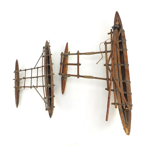 3346 - Well detailed wooden model of a catamaran boat and a smaller model, Itala, the largest 56cm in lengt... 