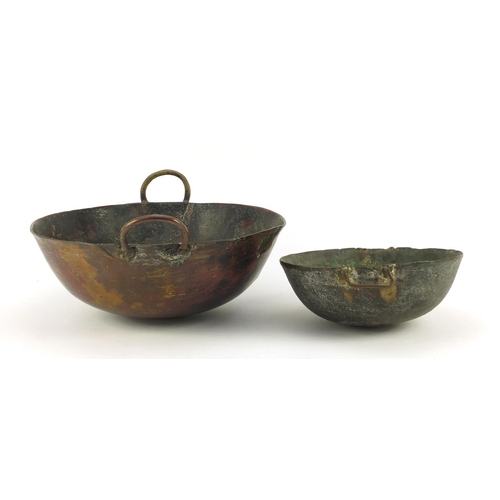 3841 - Two heavy Middle Eastern cooking bowls including a bronze example, the largest 34cm in diameter