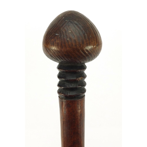 3842 - African hardwood Zulu warrior Knobkerrie, carved with geometric motifs, 94cm in length