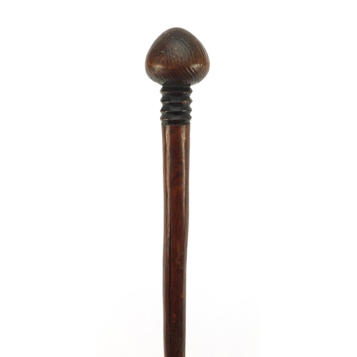 3842 - African hardwood Zulu warrior Knobkerrie, carved with geometric motifs, 94cm in length