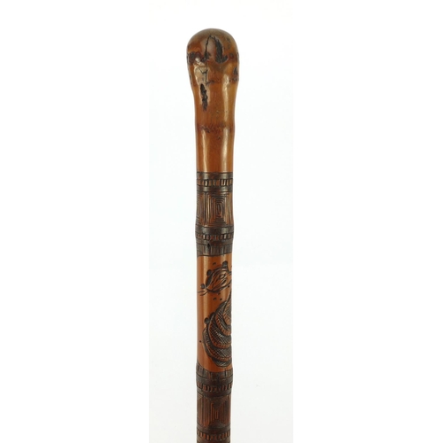 3563 - Chinese bamboo walking stick carved with warriors, 92cm in length