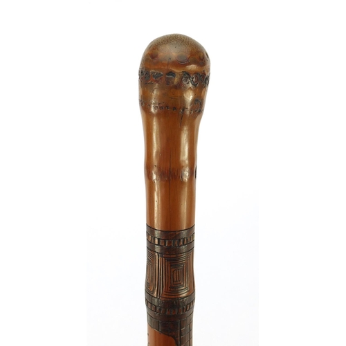 3563 - Chinese bamboo walking stick carved with warriors, 92cm in length