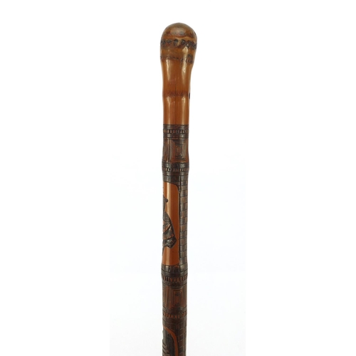 3563 - Chinese bamboo walking stick carved with warriors, 92cm in length