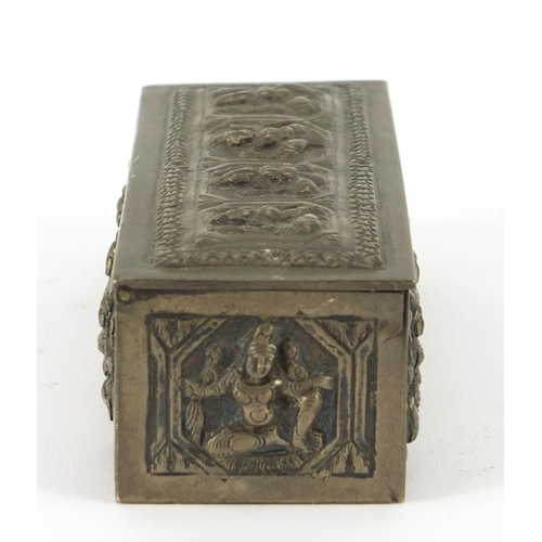 3137 - Burmese unmarked silver box with hinged lid, embossed with deities, 10cm wide, 100.9g