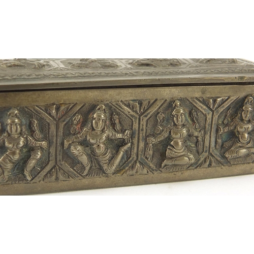 3137 - Burmese unmarked silver box with hinged lid, embossed with deities, 10cm wide, 100.9g