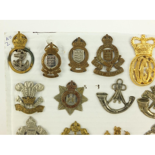 3527 - British military World War I and later cap badges including Middlesex Regiment, Royal Canadian Ordna... 