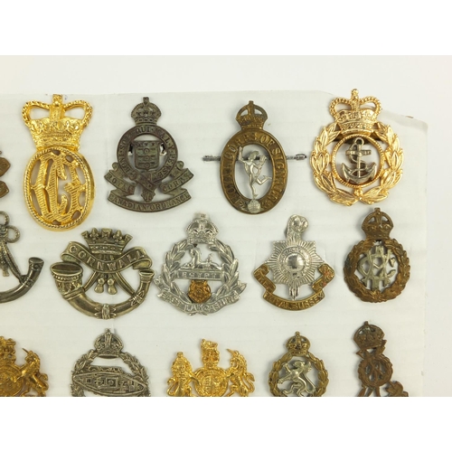 3527 - British military World War I and later cap badges including Middlesex Regiment, Royal Canadian Ordna... 