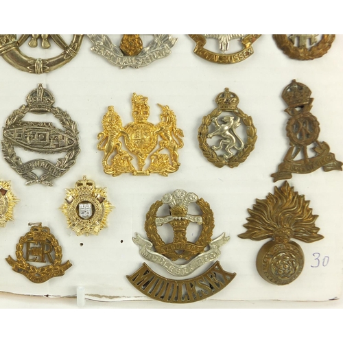 3527 - British military World War I and later cap badges including Middlesex Regiment, Royal Canadian Ordna... 