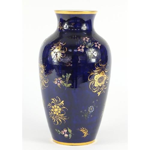 3909 - 19th century Spode porcelain ovoid vase, hand painted and gilded with floral sprays onto a blue grou... 