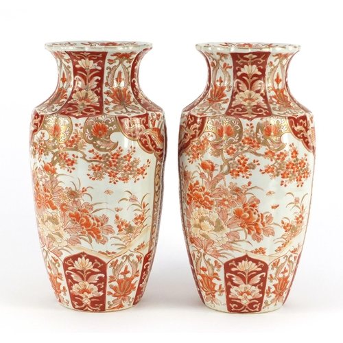 3216 - Pair of Japanese Kutani porcelain vases hand painted with flowers, each 30cm high