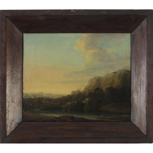 3129 - Landscape with figure before a cross in a field, 19th century oil on canvas, framed, 28.5cm x 23.5cm