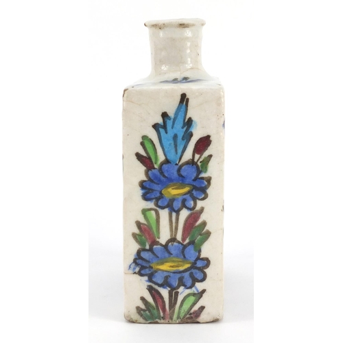 3135 - Antique Tuskish Iznik pottery flask, hand painted with flowers, 16cm high