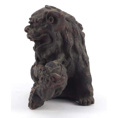 3945 - Chinese patinated bronze Foo dog, 19cm wide