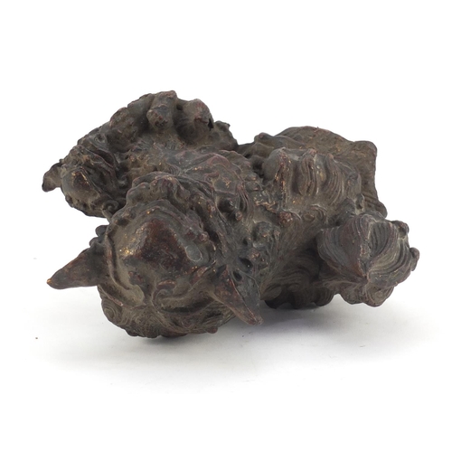 3945 - Chinese patinated bronze Foo dog, 19cm wide