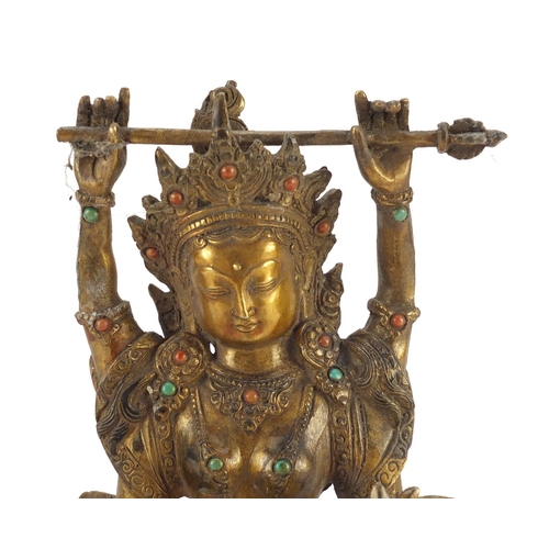 3944 - Chino-Tibetan gilt bronze deity set with coloured cabochons, 26cm high