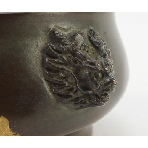 3040 - Chinese patinated bronze splashed incense burner with pierced lid and twin handles, impressed marks ... 