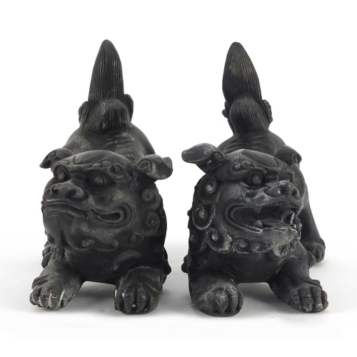 3943 - Pair of Chinese patinated bronze Foo dogs, each 16cm in length