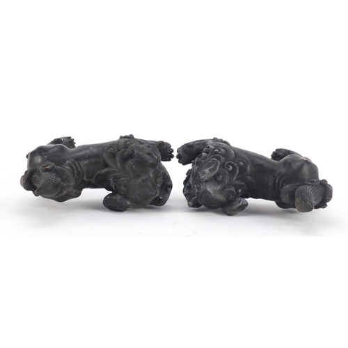 3943 - Pair of Chinese patinated bronze Foo dogs, each 16cm in length