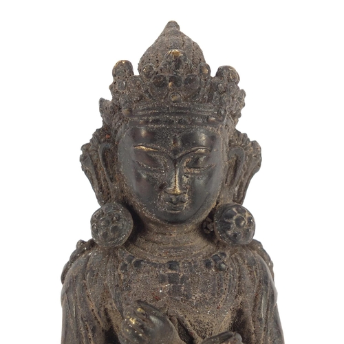 3567 - Chino-Tibetan patinated bronze figure of seated Buddha, 19cm high