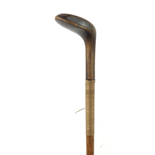 3340 - Golfing interest Sunday walking stick putter inset with  brass, 90cm in length