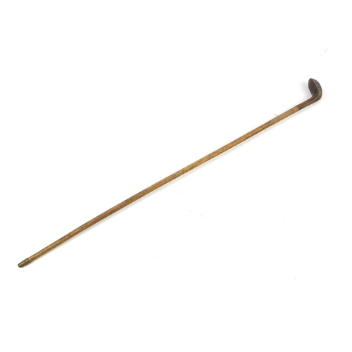 3340 - Golfing interest Sunday walking stick putter inset with  brass, 90cm in length