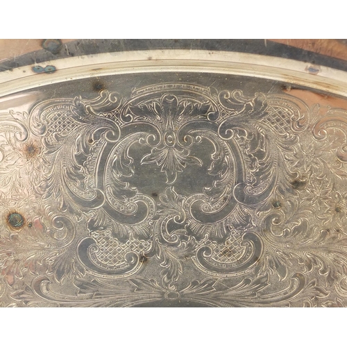 3768 - Heavy silver plated serving tray with twin handles, engraved with flowers, 63.5cm x 43cm