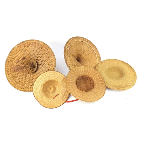 4110 - Vintage hats including two large Asian sampan and a straw boater, the largest 60cm in diameter