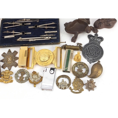 5232 - Sundry items including military cap badges, pocket lighters and bus tickets