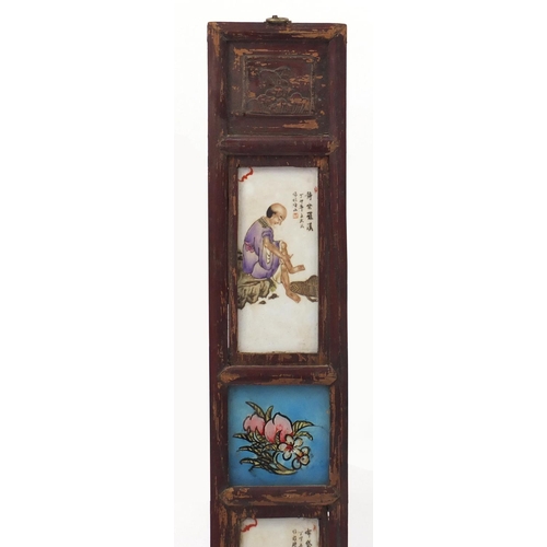 3558 - Pair of Chinese porcelain panels housed in a hardwood frame, each hand painted with monks and callig... 