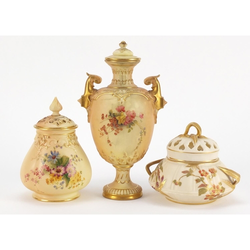 3362 - Two Royal Worcester blush ivory potpourri vases with covers and a vase with cover and twin handles, ... 