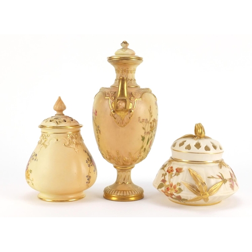 3362 - Two Royal Worcester blush ivory potpourri vases with covers and a vase with cover and twin handles, ... 