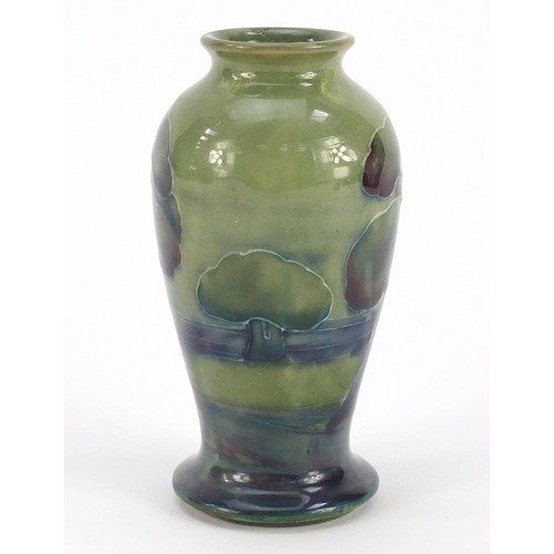 3159 - William Moorcroft pottery baluster vase hand painted in the Hazeldene pattern, 10cm high