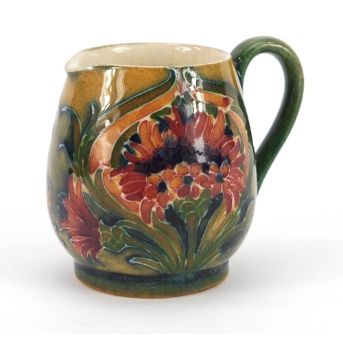 3060 - William Moorcroft miniature jug hand painted in the Revived Cornflower pattern, 5.3cm high