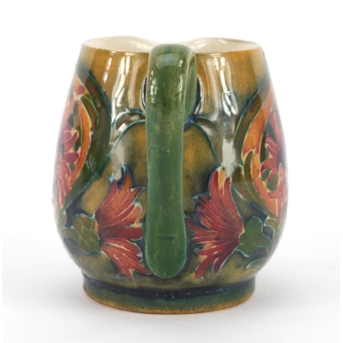 3060 - William Moorcroft miniature jug hand painted in the Revived Cornflower pattern, 5.3cm high