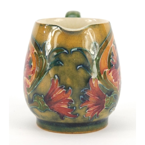 3060 - William Moorcroft miniature jug hand painted in the Revived Cornflower pattern, 5.3cm high