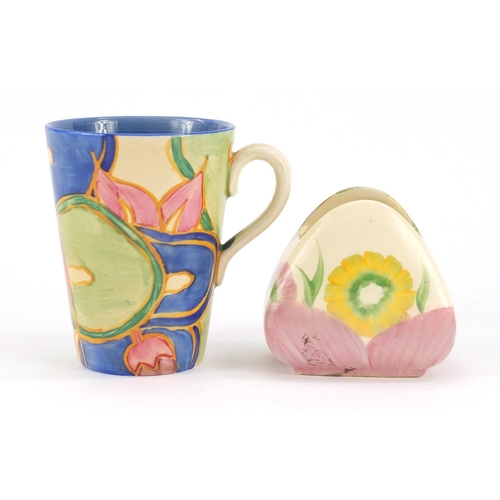 3161 - Art Deco Clarice Cliff pottery comprising a Blue Chintz mug and a Pink Pearls sugar bowl, the larges... 