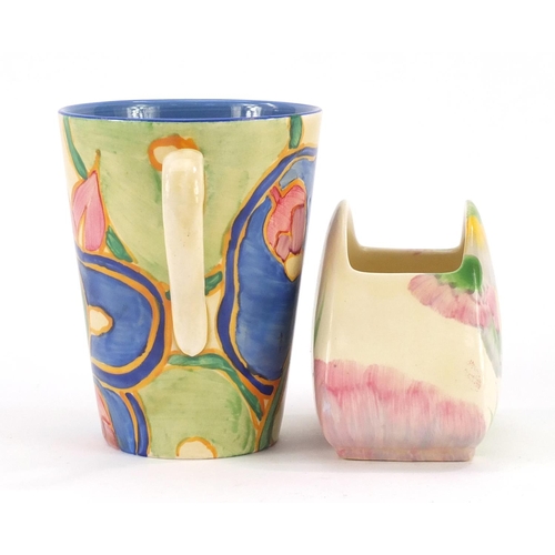 3161 - Art Deco Clarice Cliff pottery comprising a Blue Chintz mug and a Pink Pearls sugar bowl, the larges... 