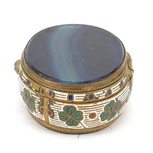 3183 - Oval enamelled brass and blue agate patch box with hinged lid, 5cm wide