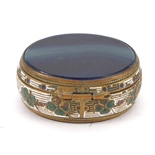 3183 - Oval enamelled brass and blue agate patch box with hinged lid, 5cm wide